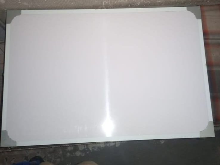 Dry erase whiteboard front — smooth white writing surface with aluminium frame